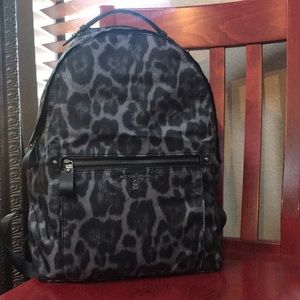 Leopard print backpack.